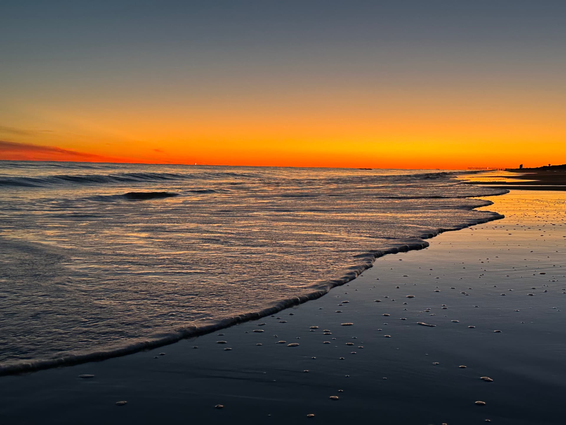 Sunrise over the surf at Ocean Isle Beach