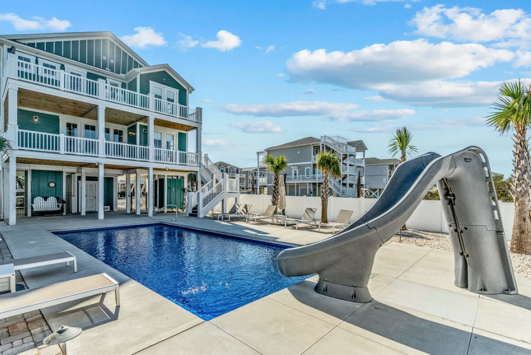 Backyard pool deck and waterslide
